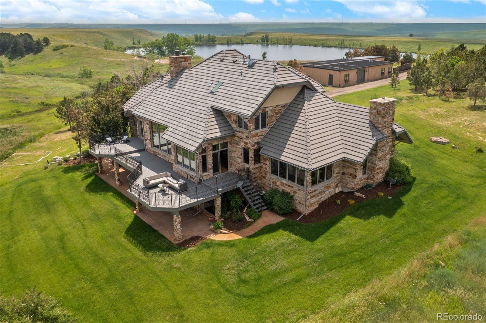 162+ acres surrounded by conserved lands and spectacular front range Flatiron views.