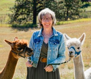 Sally on her alpaca ranch